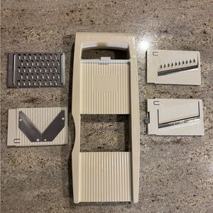 The Pampered Chef Beige and Silver Multi-Blade Mandoline Slicer Set